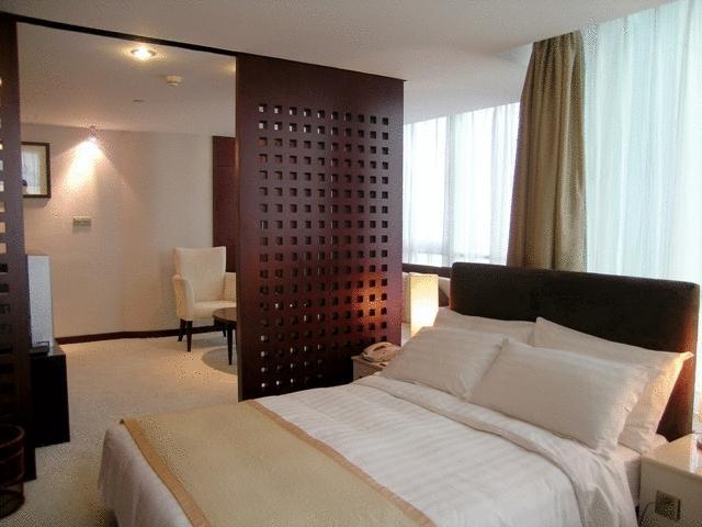 Brightel All Suites Шанхай Номер фото